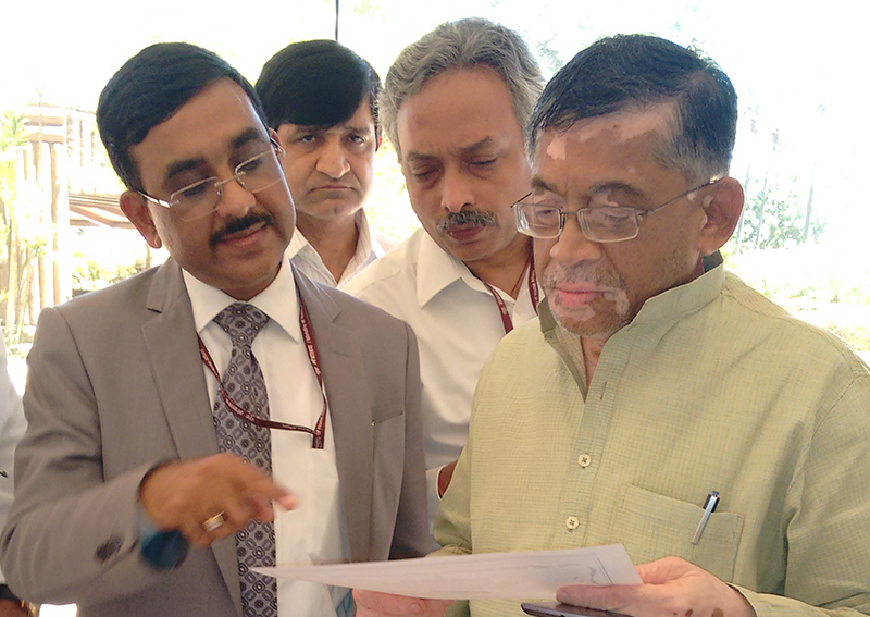 Honorable Textile Minister Shri Santosh Kumar Gangwar along with Shri P.C Vaish, Chairman and Managing Director NTCL, observing the Rajbhasha Hindi activities/functions during the Meeting of Hindi Advisory Committee of Ministry Of Textiles on 10 June 2015 held at Mumbai.